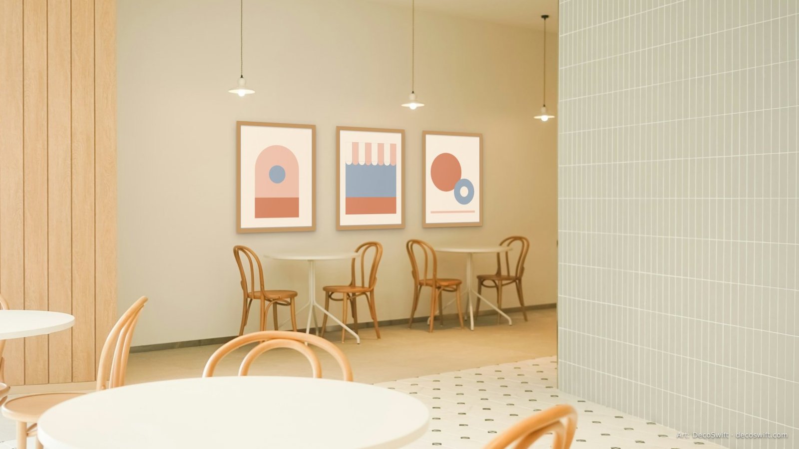 Video call background: Three Sunroom prints in slim oak frames on a white wall beside floor-to-ceiling windows, a diagonal patch of direct sun falling across the first two prints, with two black office chairs and a white lounge seat below.